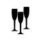 Three champagne glasses on a white background.