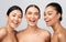 Three Cheerful Girls Posing Shirtless Smiling To Camera In Studio