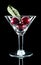 Three cherry and leaf in wine glass