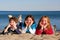 Three children on a beach