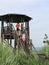 Three children descend from the observatory tower of a natural r