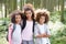 Three Children Exploring Woods Together