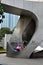 Three children play on large metal sculpture Shanghai China