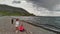 Three Children playing along the Yellowstone Lake in summer season