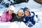 Three Children Playing in Snow