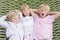 Three children relaxing and sleeping in hammock