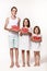 Three children in the studio stand on a white background and hold pieces of watermelon