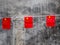 Three Chinese Flags against Concrete Wall