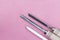 Three chisels on a pink background