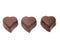 Three chocolate candy in the shape of heart