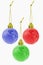 Three Christmas colorful globe ornaments