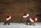 Three christmas reindeer of handmade wood with red white santa h