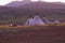 Three chums on a settlement of Zyrians - reindeer breeders at dawn. Polar Ural, Russia