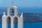 Three church bells with Mediterannean landscape