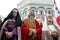 Three Church leaders standing on the churchyard of Santa Maria d