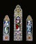Three church stained glass windows,
