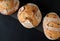 Three Circular-Shaped Sourdoughs on Dark Background