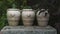Three clay pots at autumn garden
