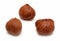 Three clear hazelnuts