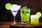 Three cocktails of lemon alcohol. Brazilian caipirinha, cuban mojito and margarita frozem. World drinks, refreshing for the summer