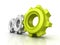 Three cogwheel gears with green leader on white background