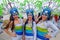 Three colombian girls dancers with colorful and