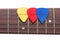 Three color mediators on a guitar fingerboard