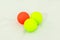 Three colored golf balls