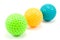 Three colored golf balls