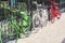 Three colorful bikes - green, white and red - are on the dutch street