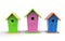 Three colorful birdhouses on a white background