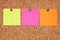 Three colorful blank notes.