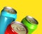 Three colorful drink cans