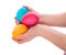 Three colorful easter eggs in child hands