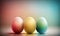 three colorful eggs sitting next to each other on a table with a blurry background in the backround of the photo, with a soft