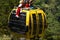 Three colorful gondolas cable cars as they transport people up and down in the Caracol Park