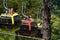 Three colorful gondolas cable cars as they transport people up and down in the Caracol Park