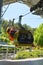 Three colorful gondolas cable cars as they transport people up and down in the Caracol Park