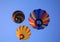 Three colorful hot air balloons in flight, seen from below, Gualdo Cattaneo, Perugia, Umbria, Italy, 2023