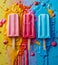Three colorful popsicles with splatters on a colorful background