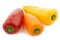 Three colorful sweet snack peppers `capsicum`