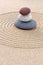 Three coloured round pebbles zen garden