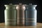 Three colourful ceramic canisters on timber bench with grey spot on background