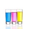 Three colourful shot drinks on a white background with reflections