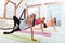 Three concentrated women enjoying sport in gym