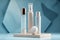 Three cosmetic product mockups on geometric podiums. Background for presentation of cosmetic