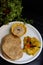 Three course Indian meal, served on black background