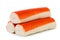 Three crab sticks close up on a white. Isolated