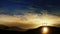 Three crosses on the hill and Jesus tomb with clouds moving on the starry sky