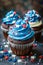 Three cupcakes with blue frosting and red and white sprinkles on top. Generative AI